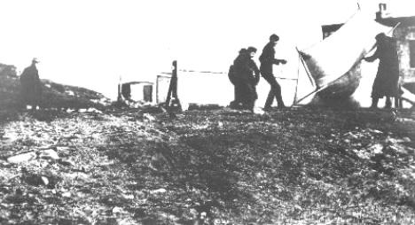Marconi and his assistants at St. John's, Newfoundland, raising a kite to support the wire for his receiving aerial
