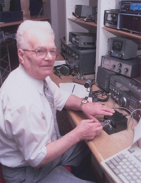 One hundred years after Marconi's first official transatlantic wireless telegraph message, Bill Appleton of Sydney's amateur radio club transmits a commemorative message to Poldhu on December 15, 2002